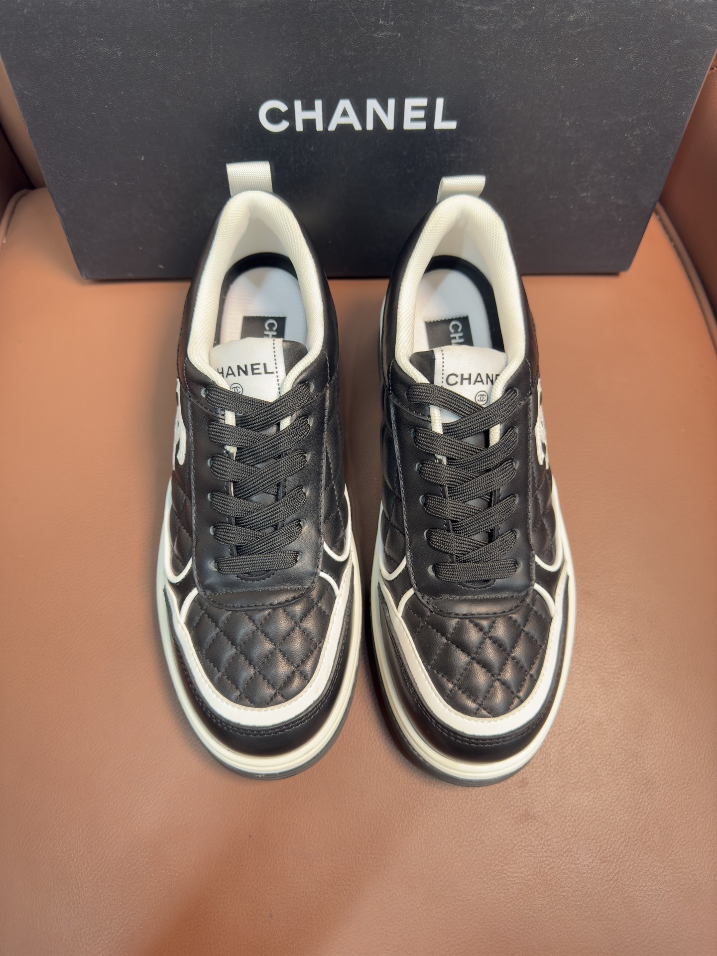 Chanel Quilted Leather Sneakers Black & White Designer Trainers
