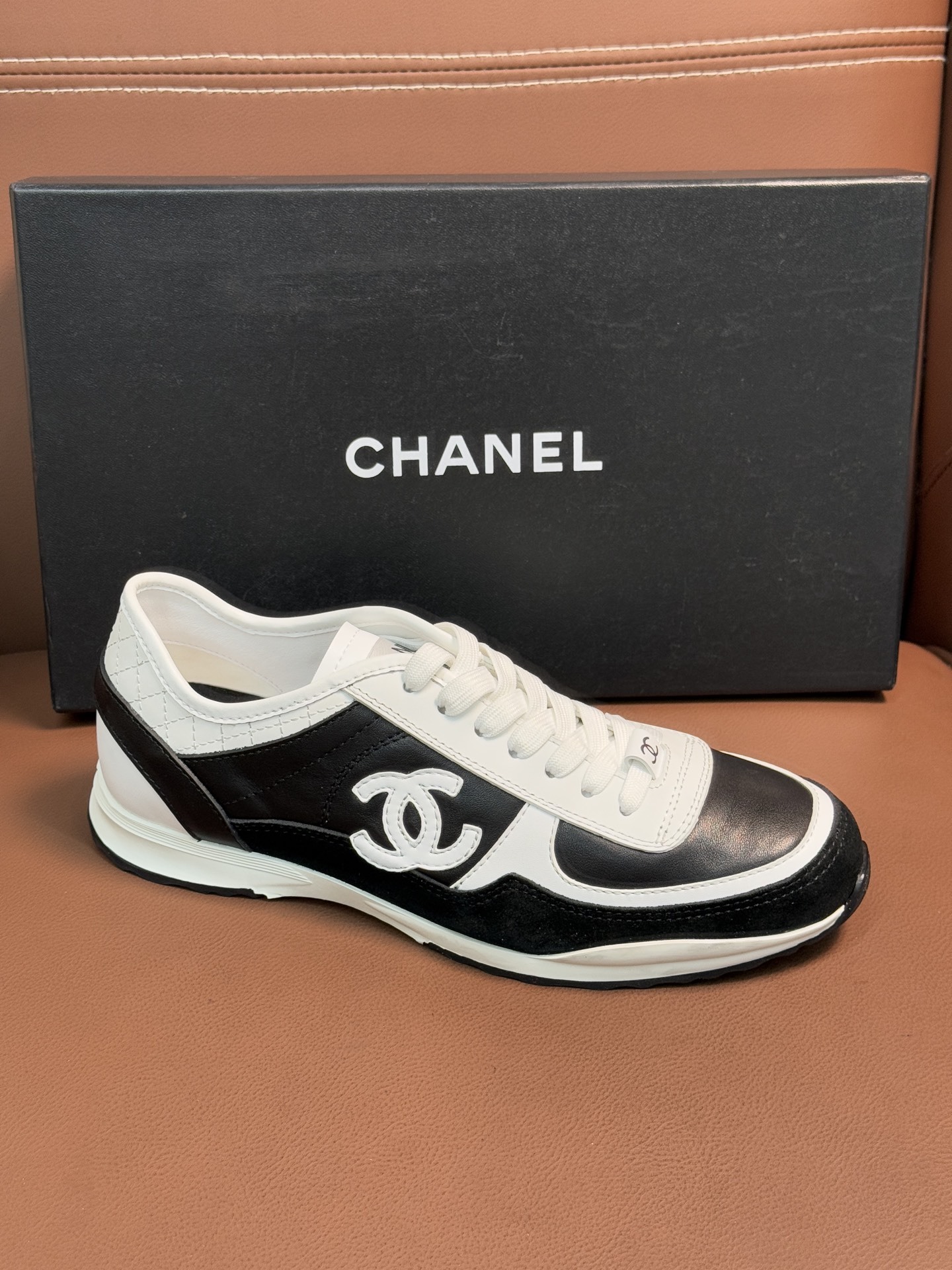 Chanel Women's Black & White Leather Sneakers - Classic CC Logo