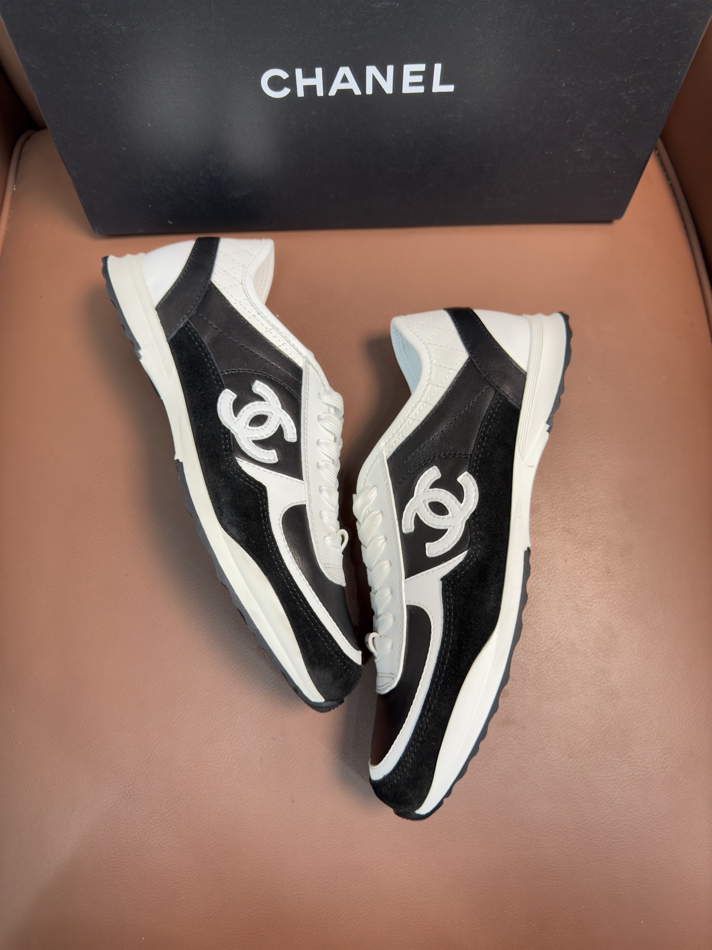 Chanel Women's Black & White Leather Sneakers - Classic CC Logo