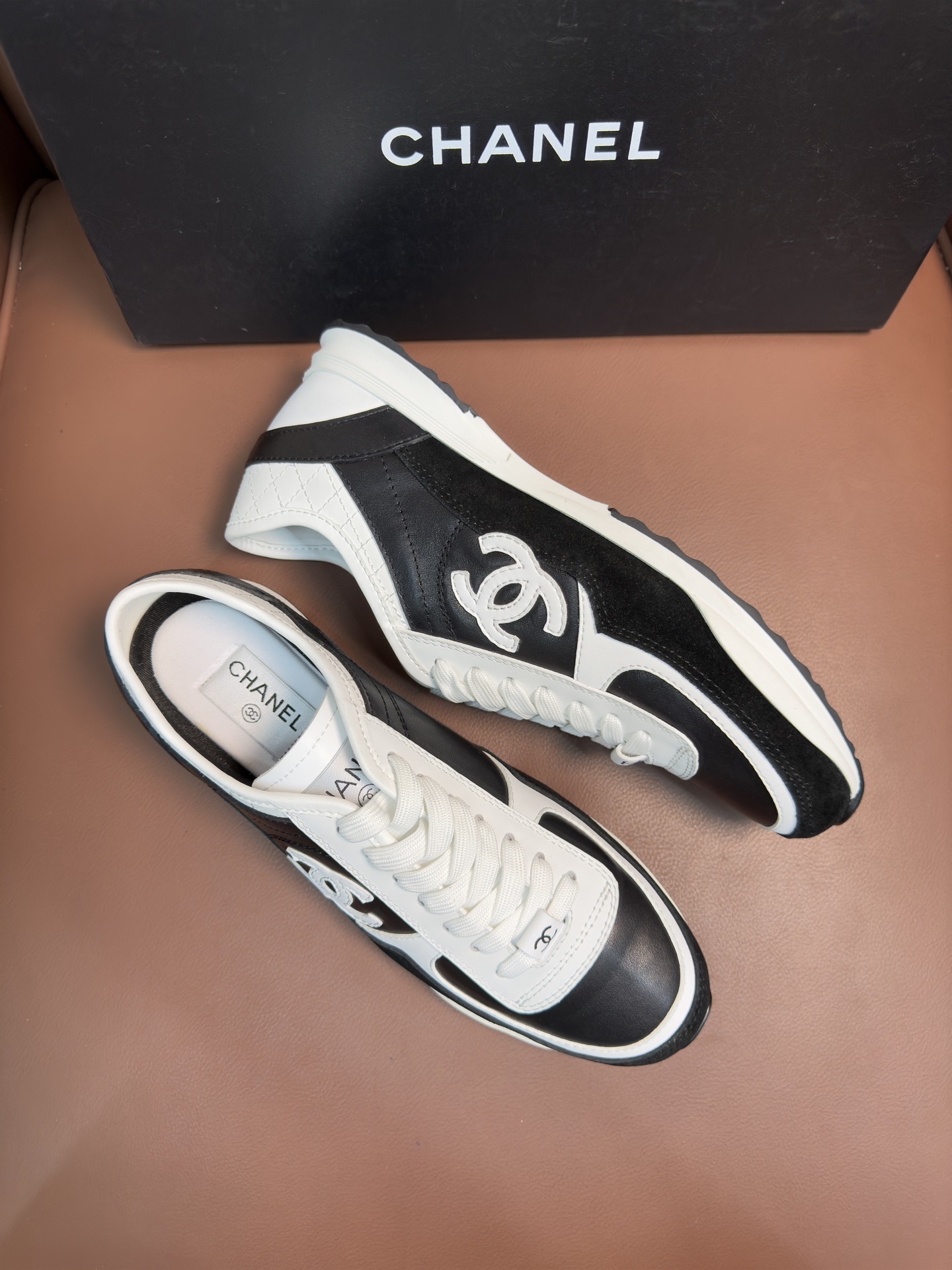 Chanel Women's Black & White Leather Sneakers - Classic CC Logo