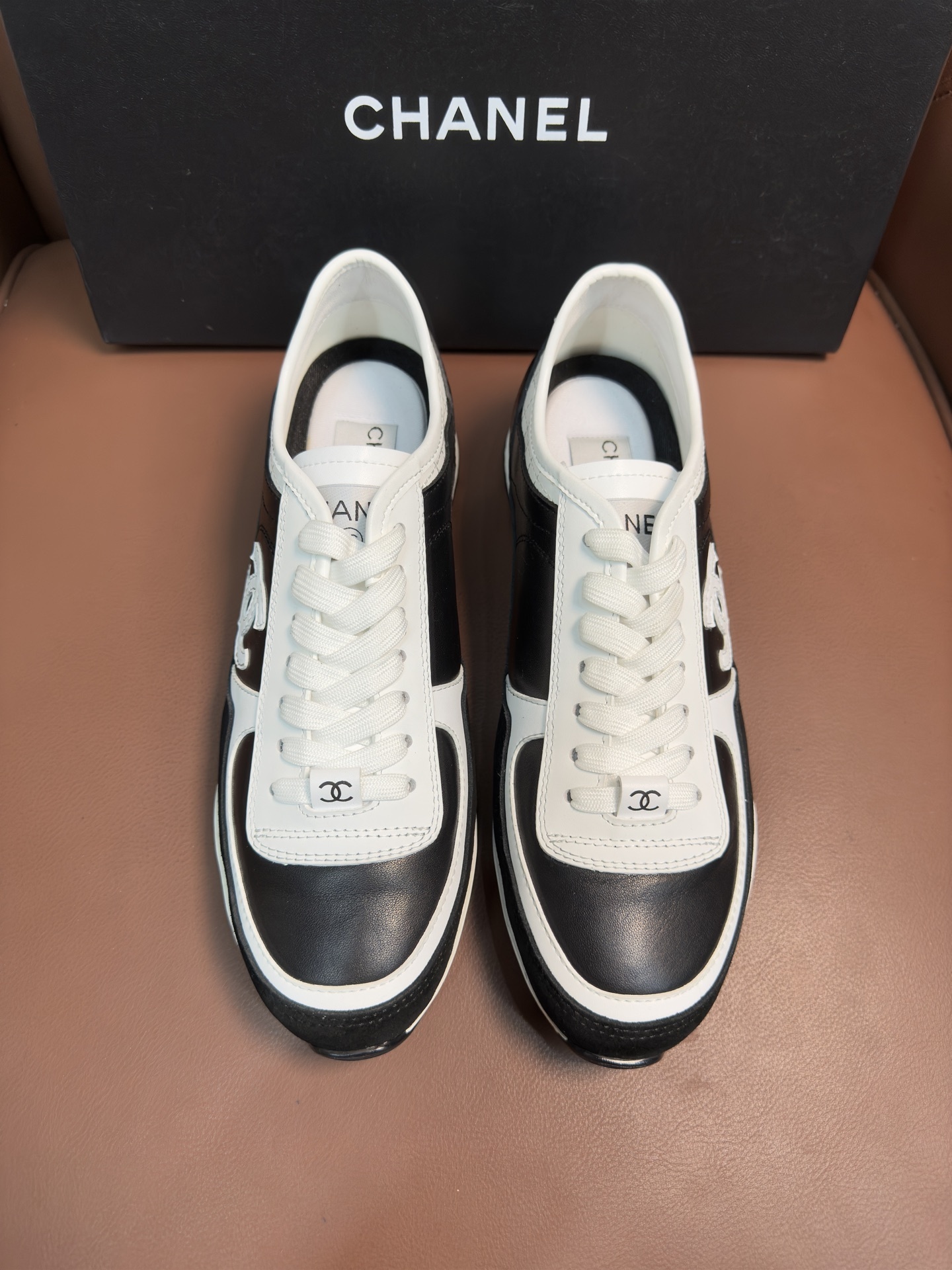 Chanel Women’s Black & White Leather Sneakers – Classic CC Logo