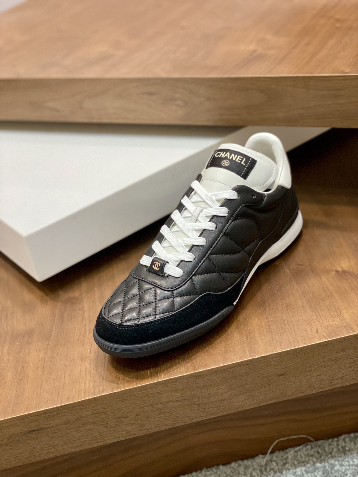 Chanel Black Quilted Leather Sneakers - Luxury Sporty Design