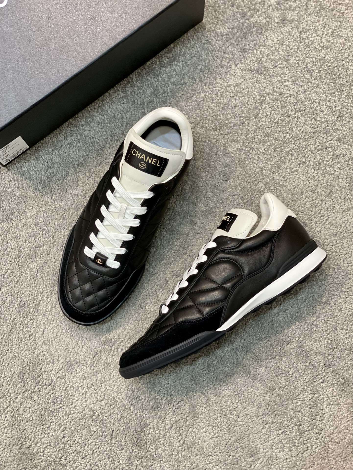 Chanel Black Quilted Leather Sneakers - Luxury Sporty Design