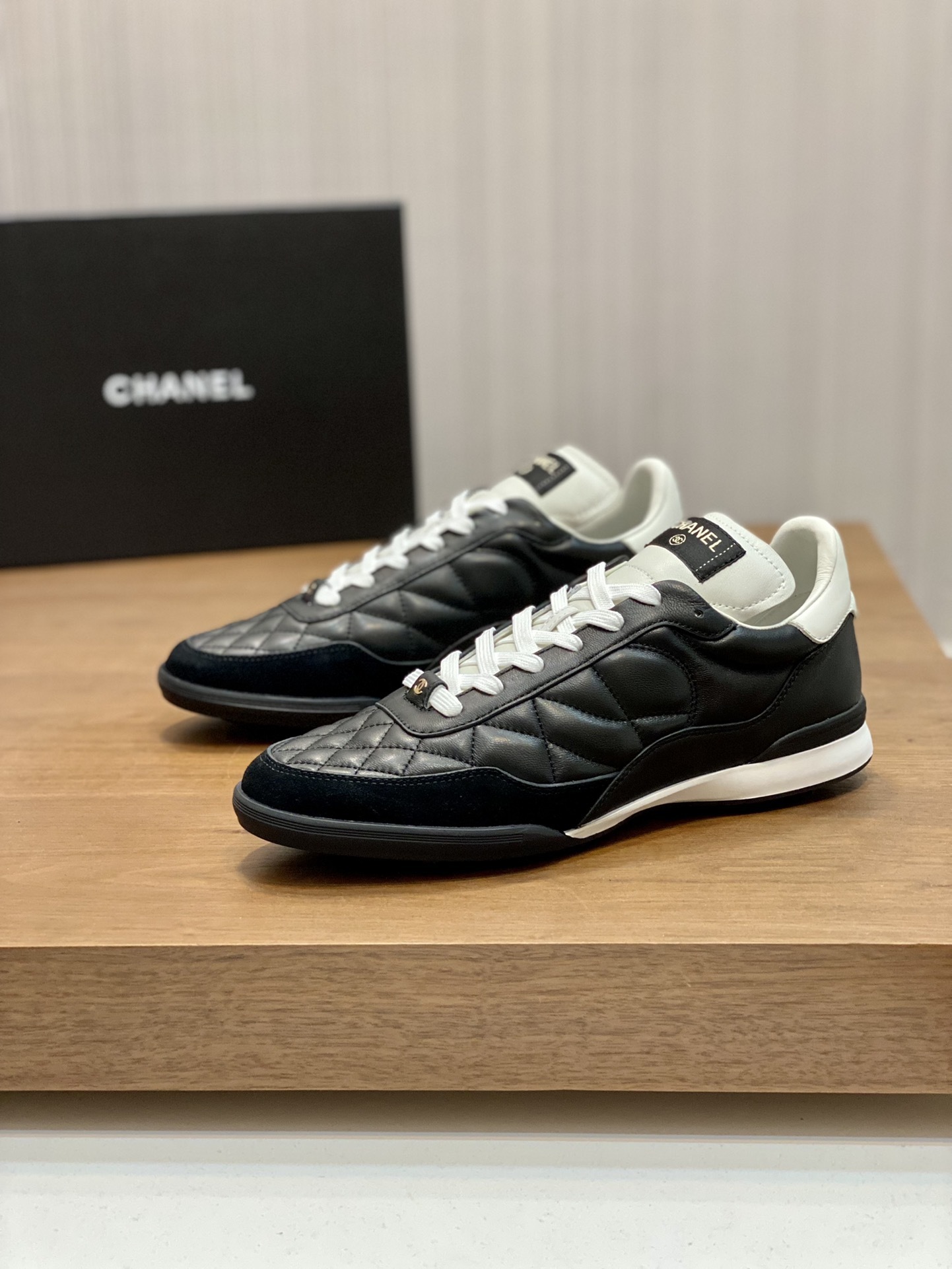 Chanel Black Quilted Leather Sneakers - Luxury Sporty Design