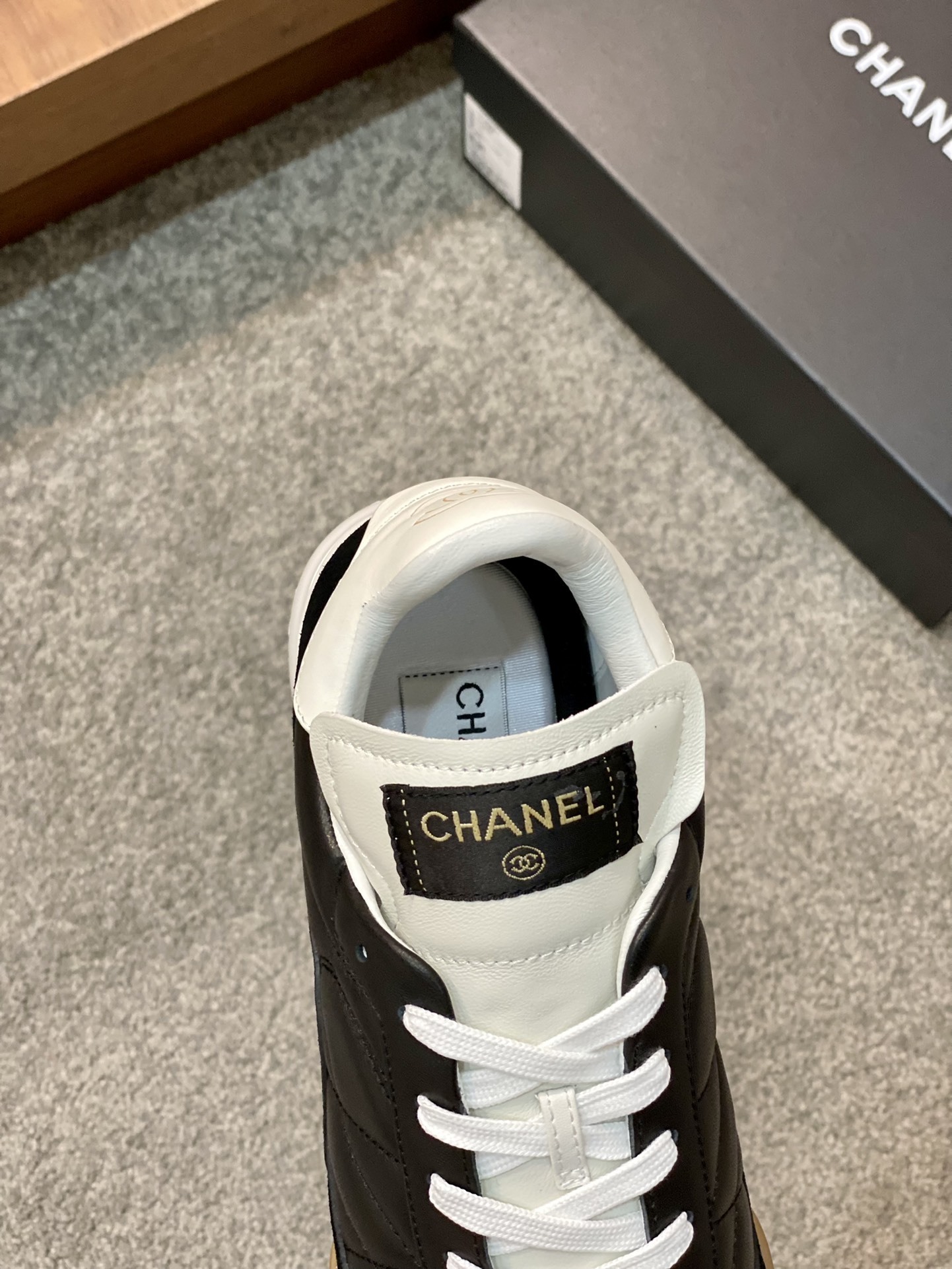 Chanel Quilted Leather Sneakers - Black & White Luxury Low-Tops