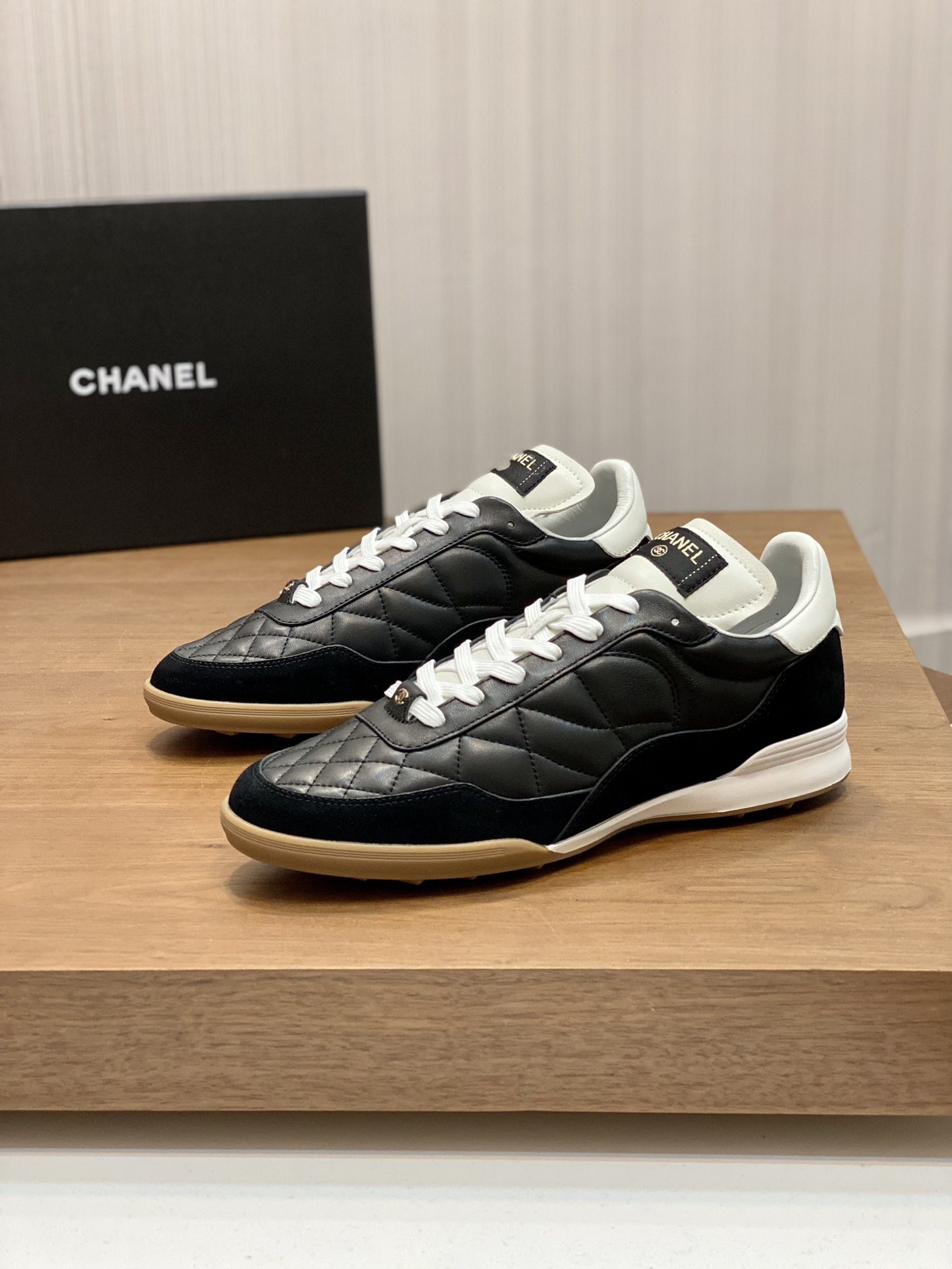 Chanel Quilted Leather Sneakers - Black & White Luxury Low-Tops