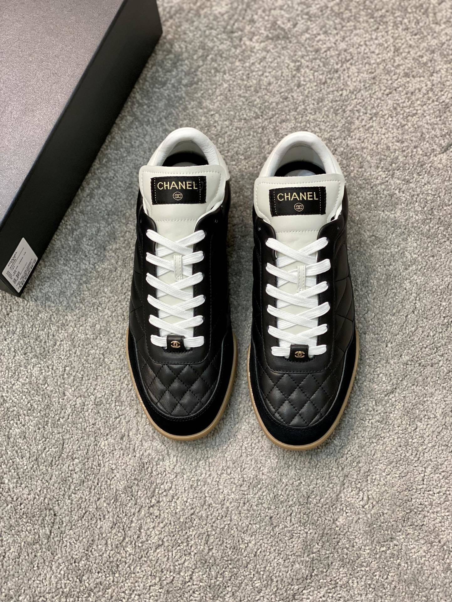 Chanel Quilted Leather Sneakers – Black & White Luxury Low-Tops