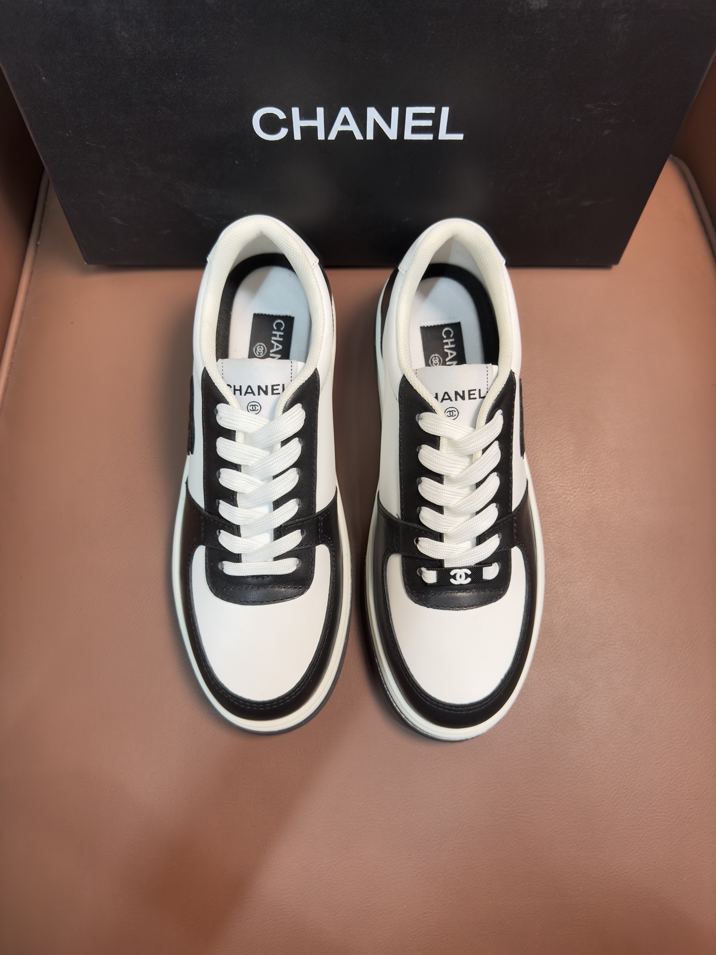Chanel Black and White Leather Sneakers – Luxury Designer Trainers