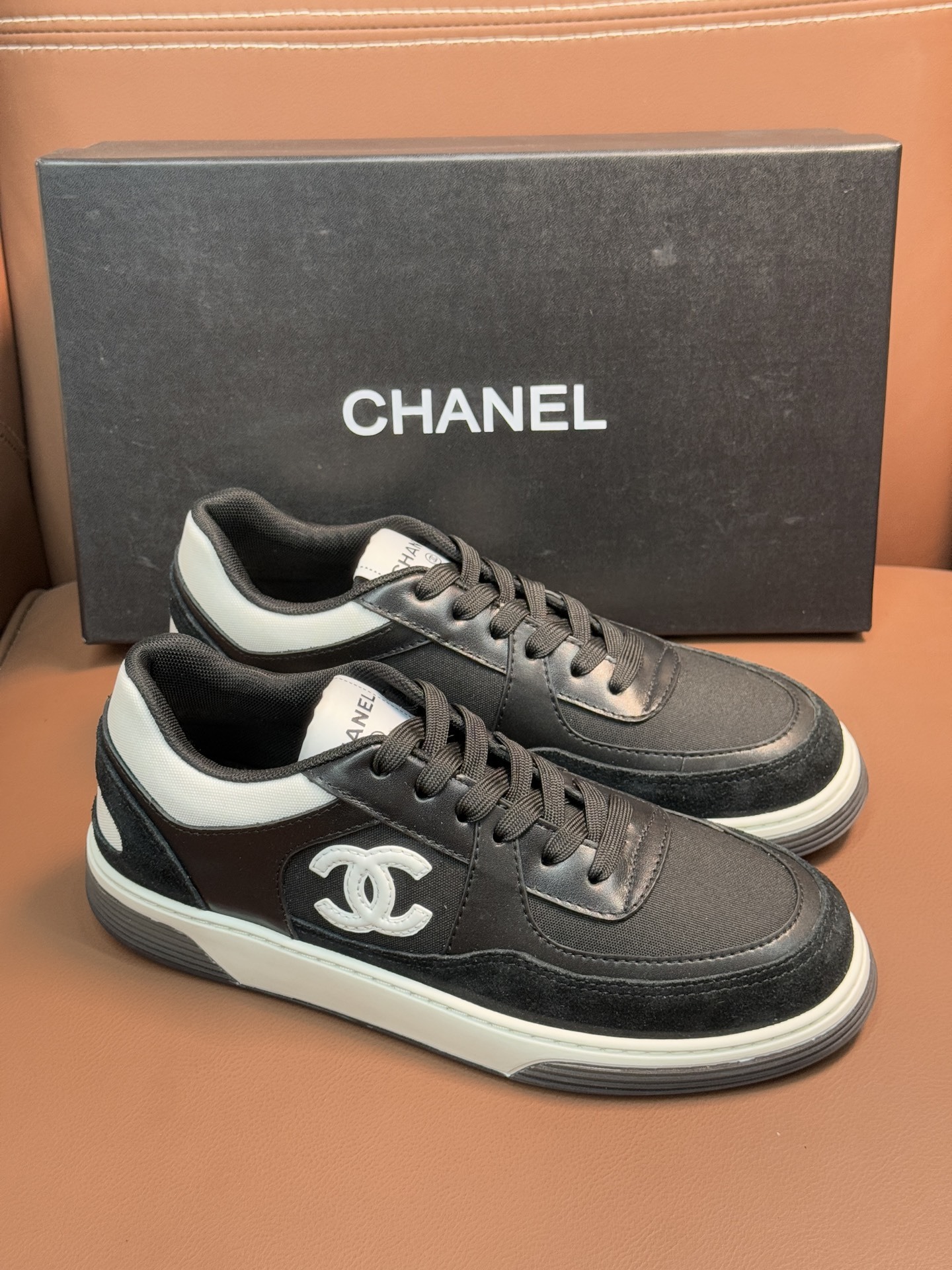 Chanel CC Logo Black & White Low-Top Sneakers - Luxury Fashion