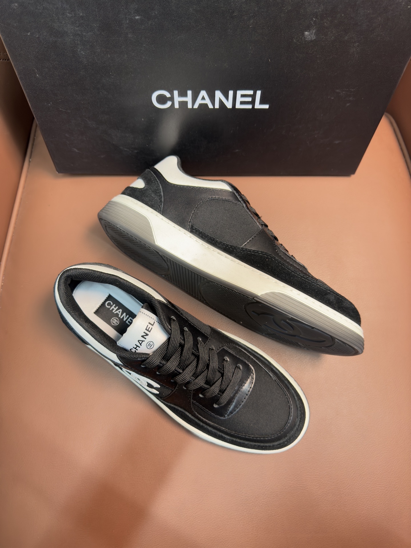 Chanel CC Logo Black & White Low-Top Sneakers - Luxury Fashion