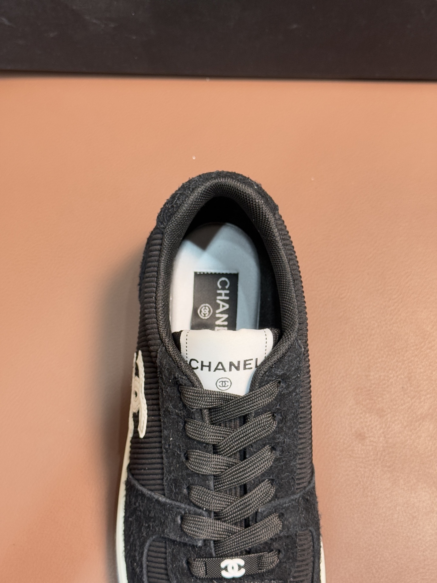 Chanel Luxury Black Ribbed Fabric Sneakers with Iconic CC Logo