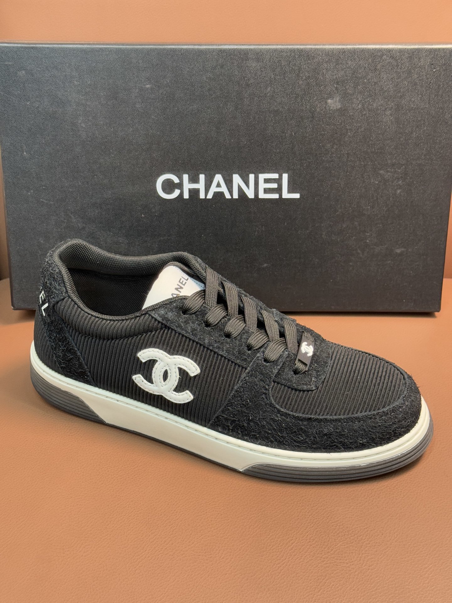 Chanel Luxury Black Ribbed Fabric Sneakers with Iconic CC Logo