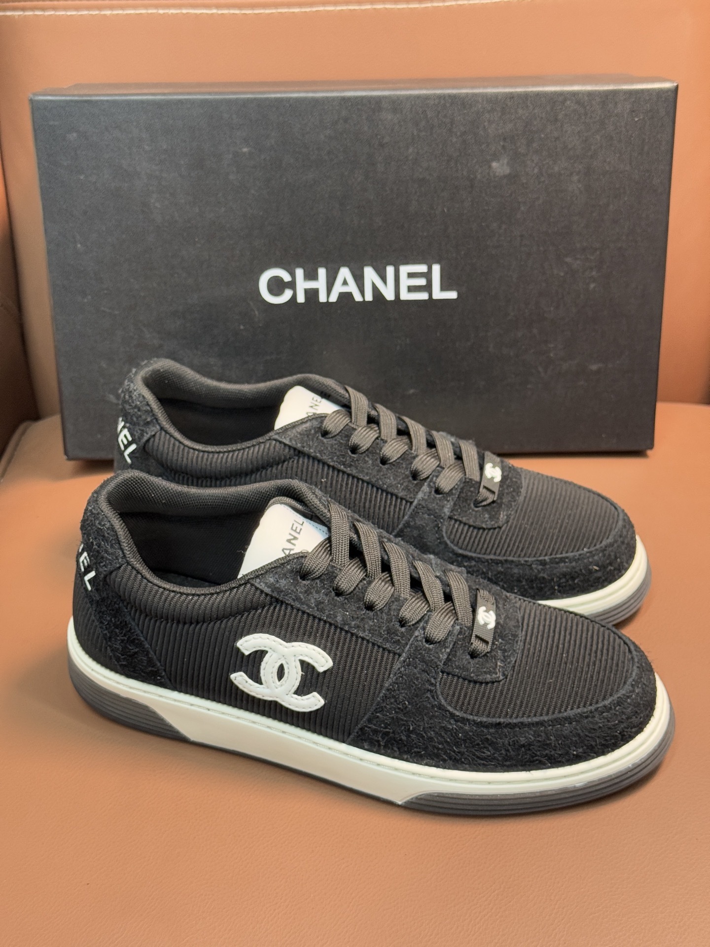Chanel Luxury Black Ribbed Fabric Sneakers with Iconic CC Logo