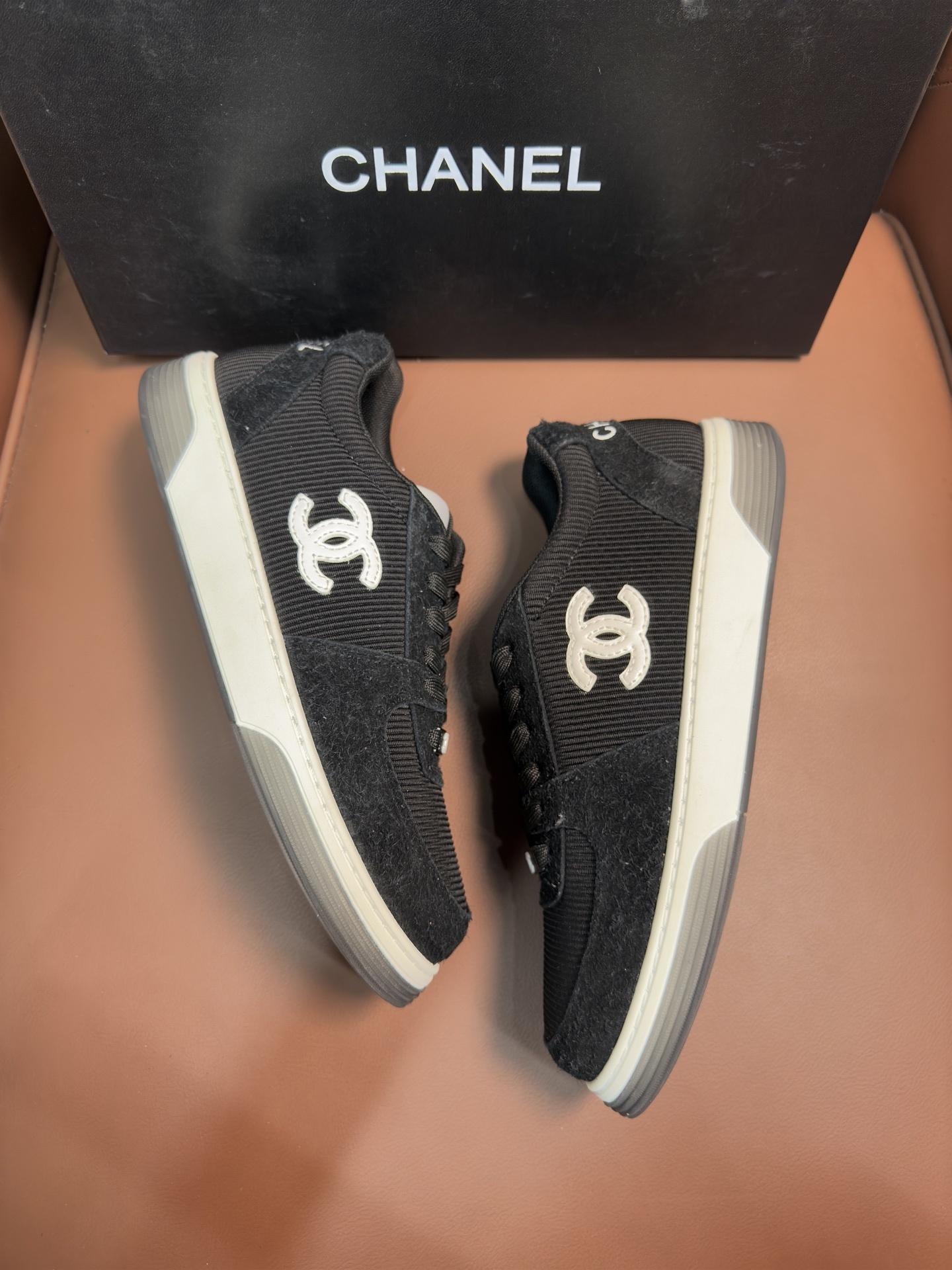 Chanel Luxury Black Ribbed Fabric Sneakers with Iconic CC Logo