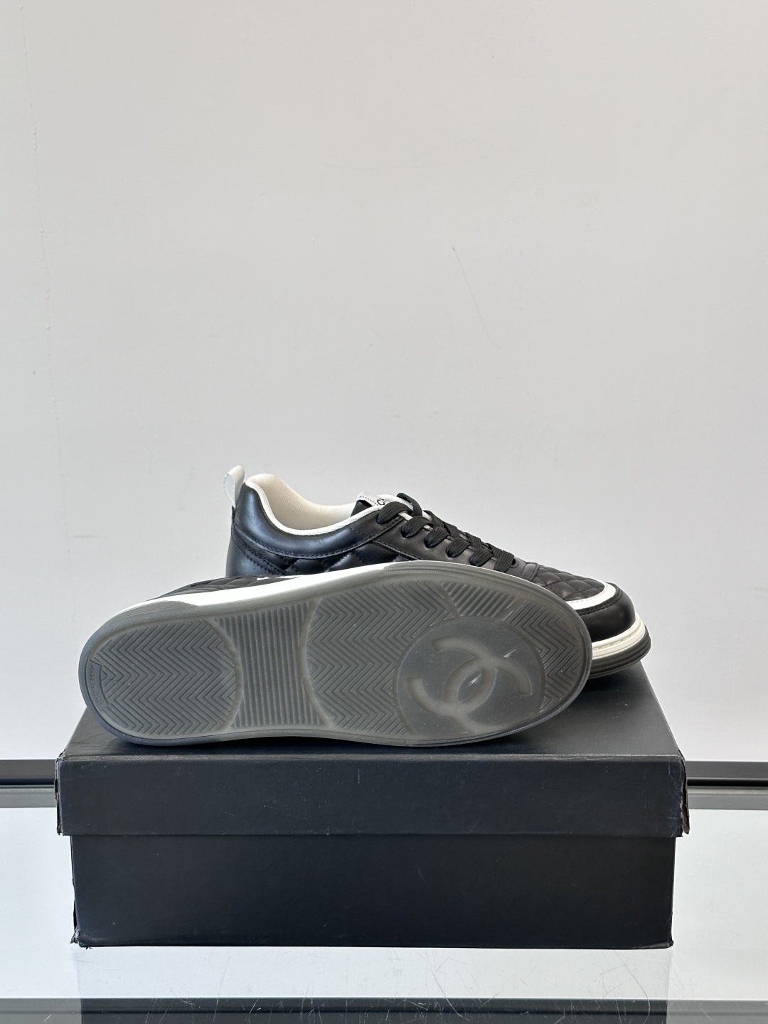 Luxury Black Quilted Leather Sneakers with White Interlocking C