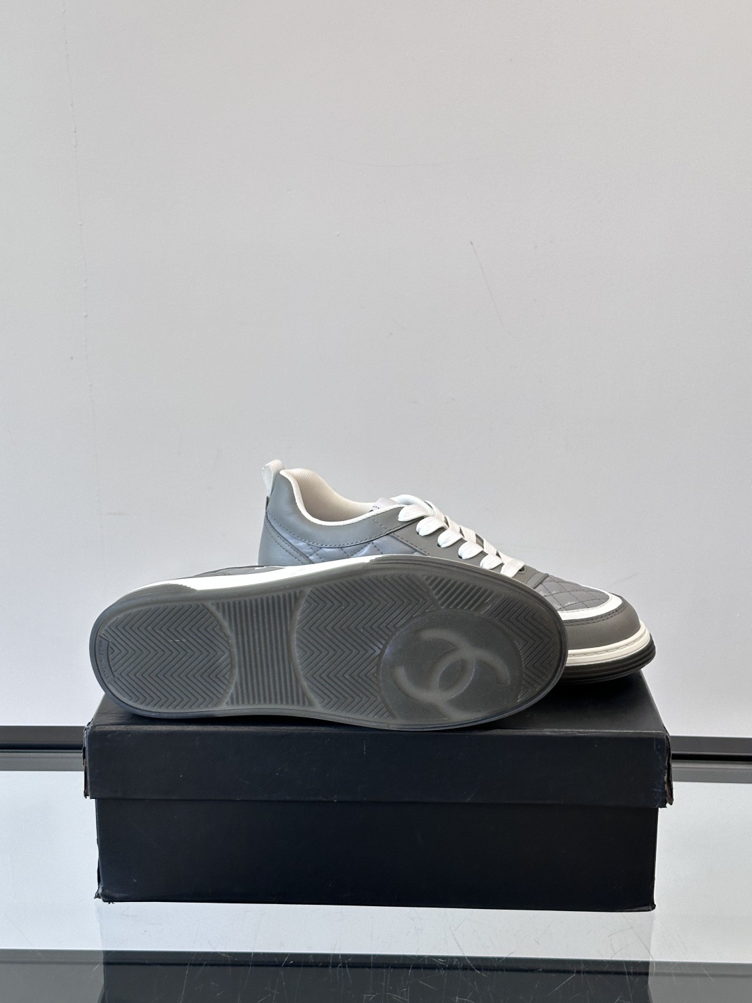Luxury Chanel Gray Quilted Low-Top Sneakers - Women's Designer Shoes