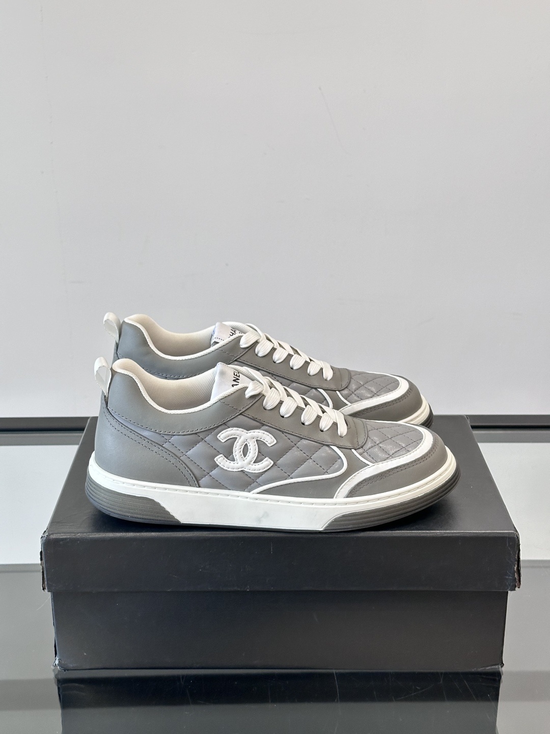 Luxury Chanel Gray Quilted Low-Top Sneakers – Women’s Designer Shoes
