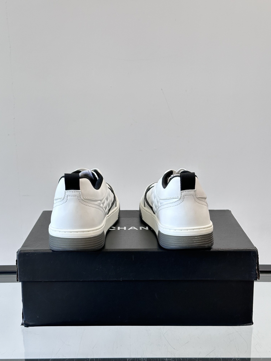 Chanel White Quilted Leather Sneakers with Black CC Logo