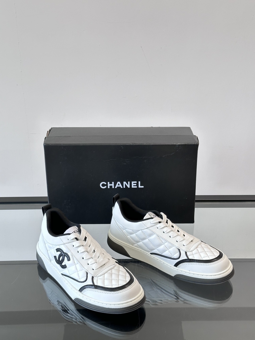Chanel White Quilted Leather Sneakers with Black CC Logo