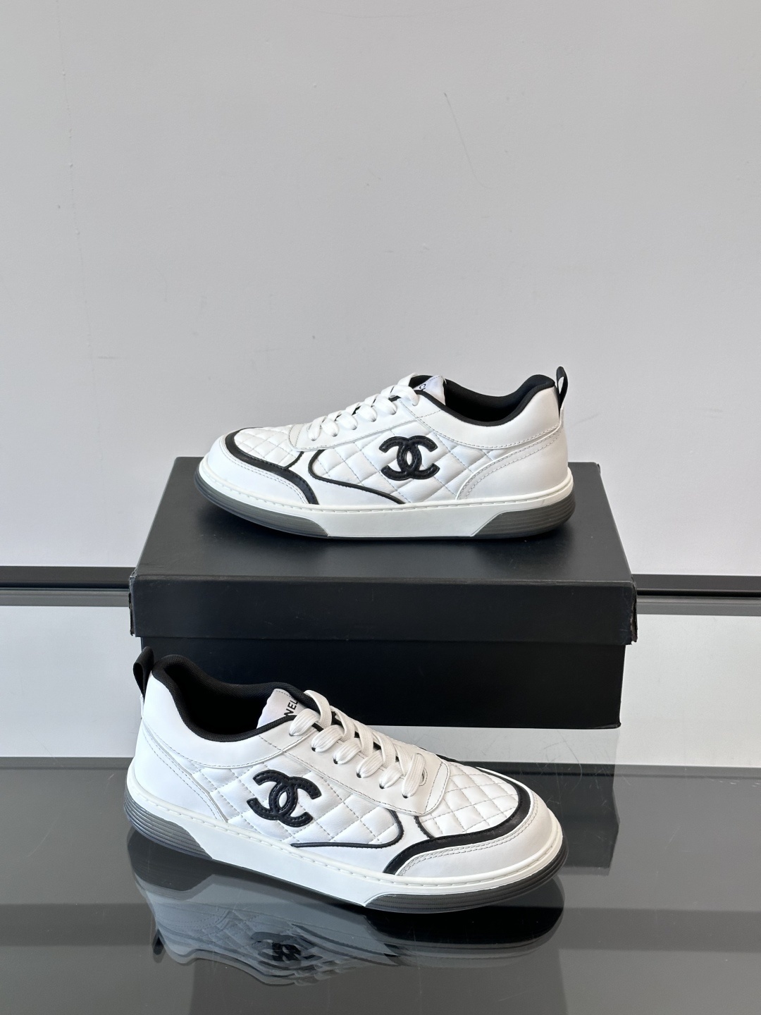 Chanel White Quilted Leather Sneakers with Black CC Logo