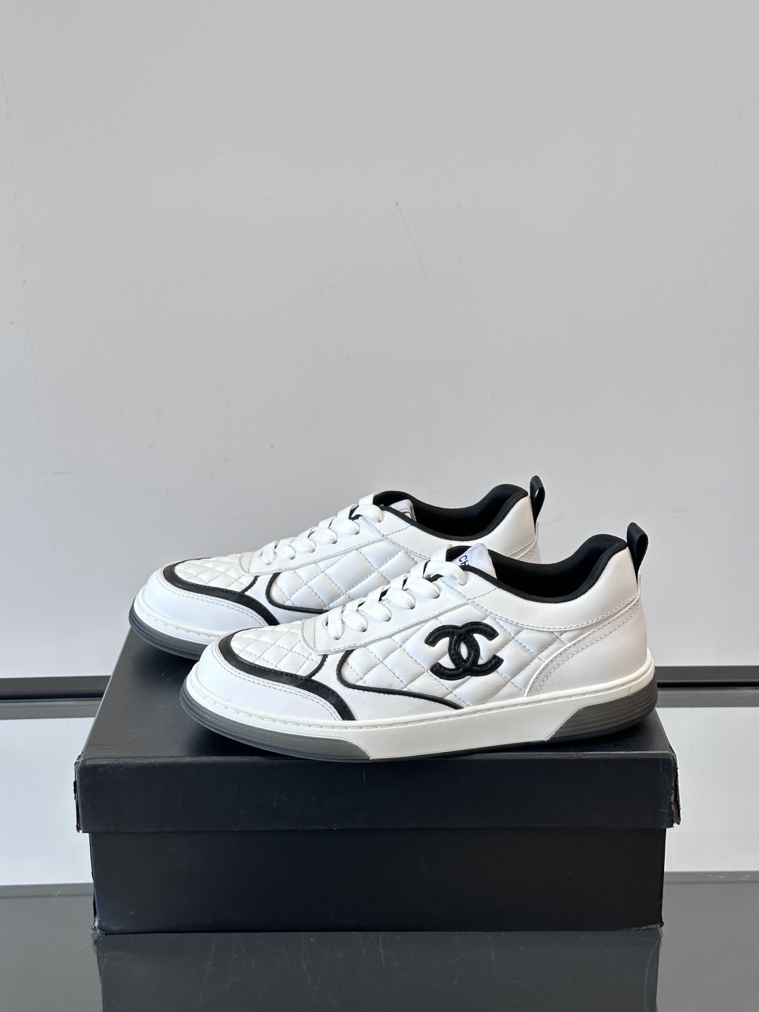 Chanel White Quilted Leather Sneakers with Black CC Logo