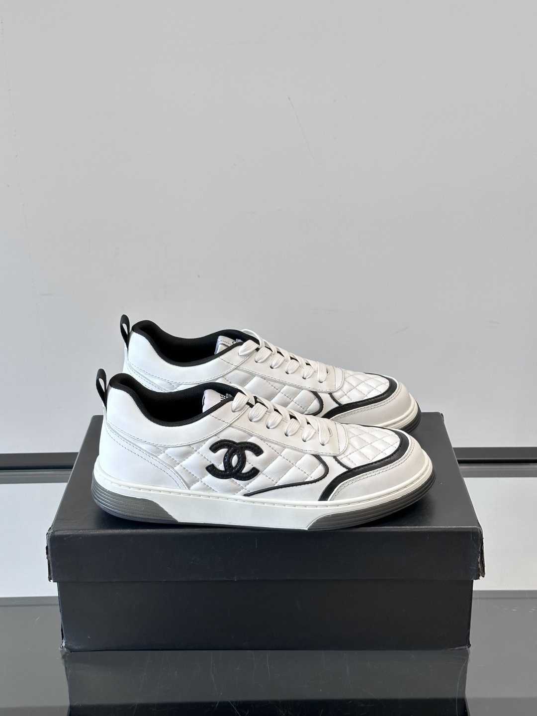 Chanel White Quilted Leather Sneakers with Black CC Logo