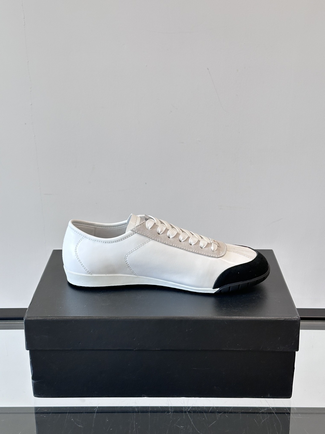 Chanel White Leather & Suede Sneakers with Black Toe Cap