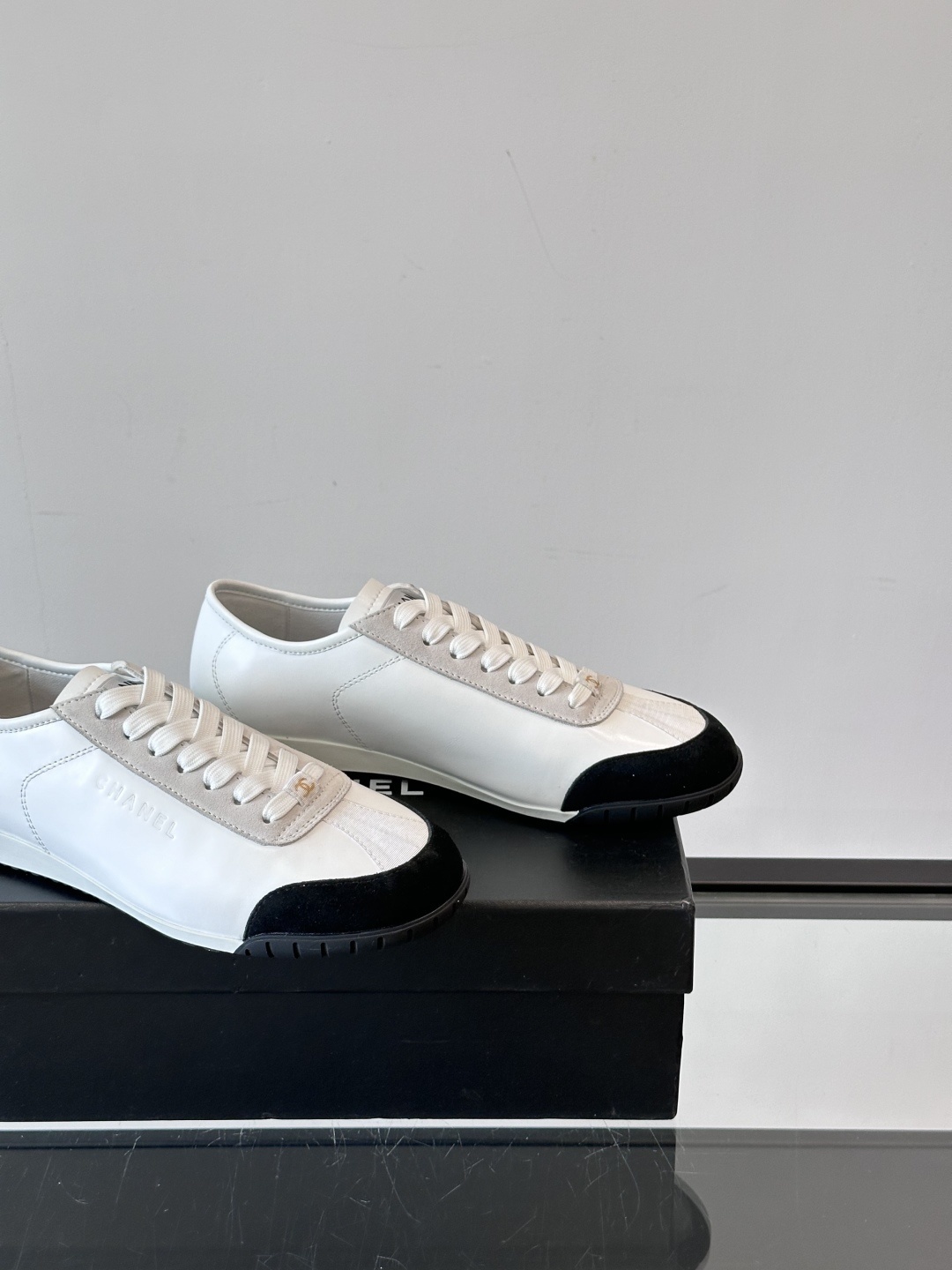 Chanel White Leather & Suede Sneakers with Black Toe Cap