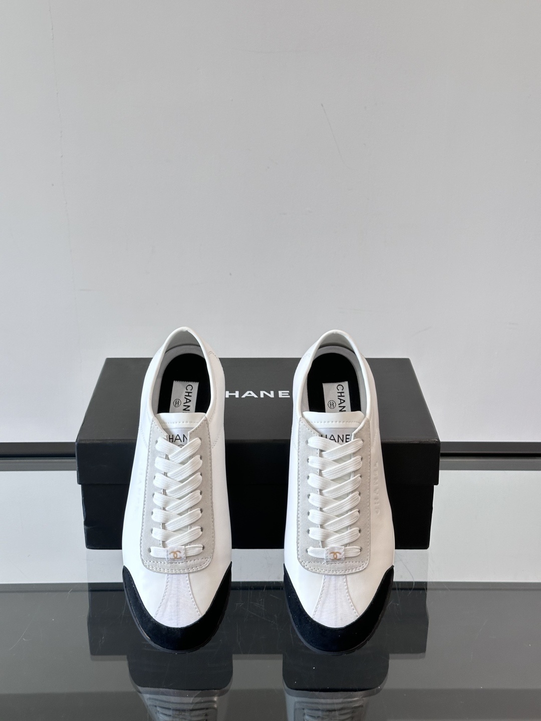 Chanel White Leather & Suede Sneakers with Black Toe Cap