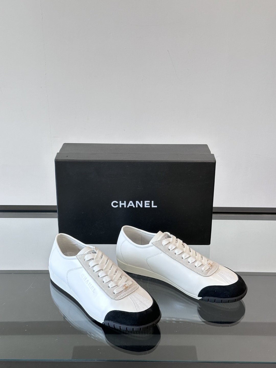 Chanel White Leather & Suede Sneakers with Black Toe Cap