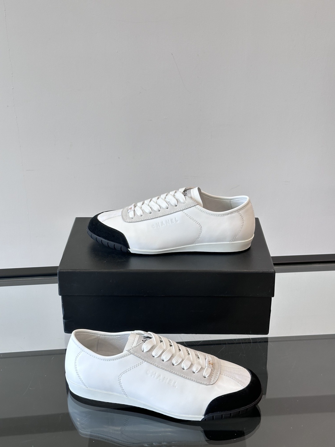 Chanel White Leather & Suede Sneakers with Black Toe Cap