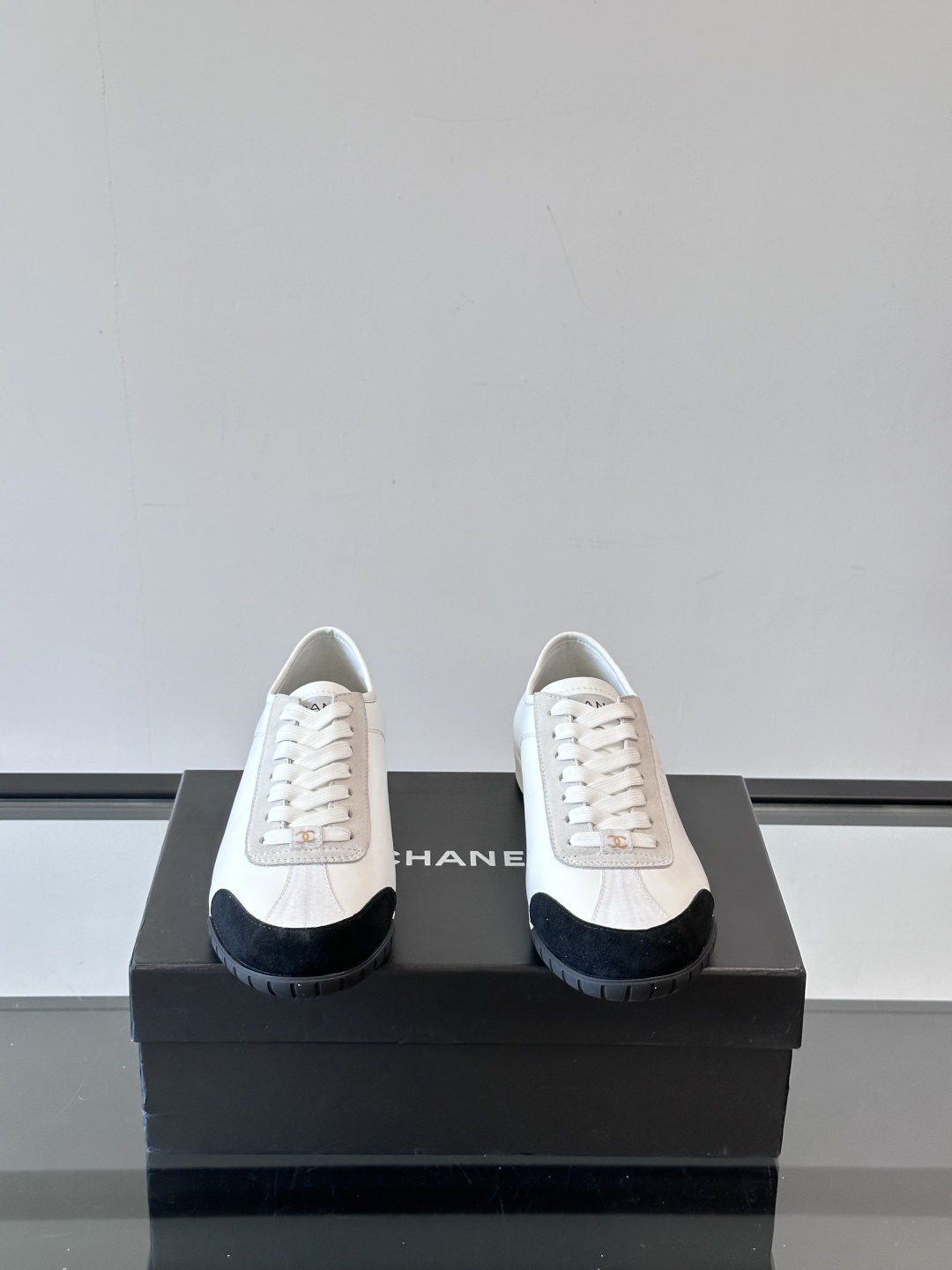 Chanel White Leather & Suede Sneakers with Black Toe Cap
