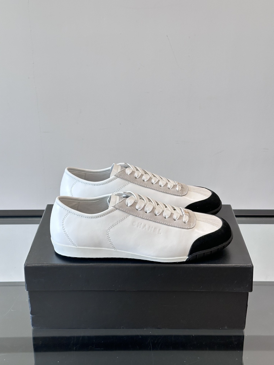 Chanel White Leather & Suede Sneakers with Black Toe Cap