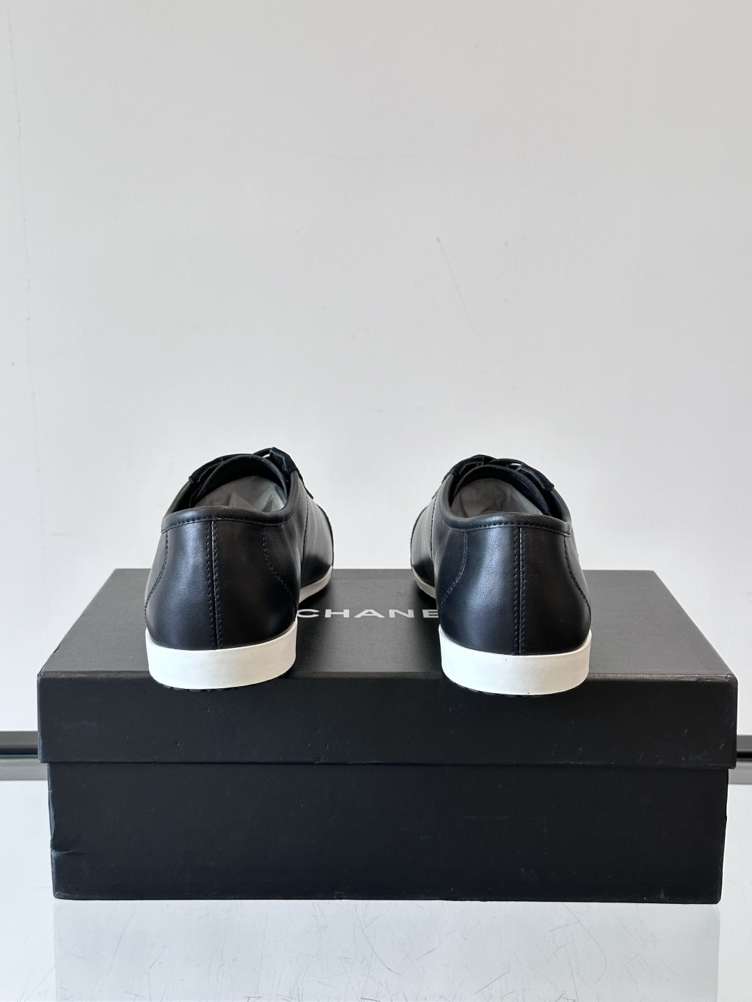 Chanel Luxury Black Leather and Suede Low-Top Sneakers