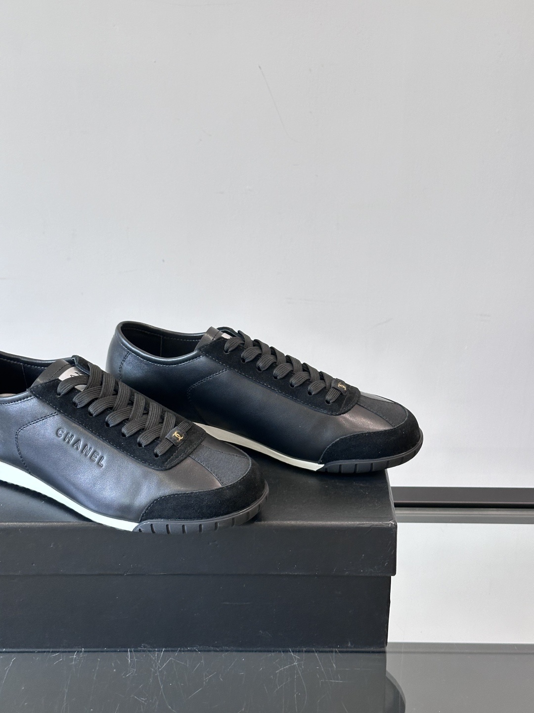Chanel Luxury Black Leather and Suede Low-Top Sneakers