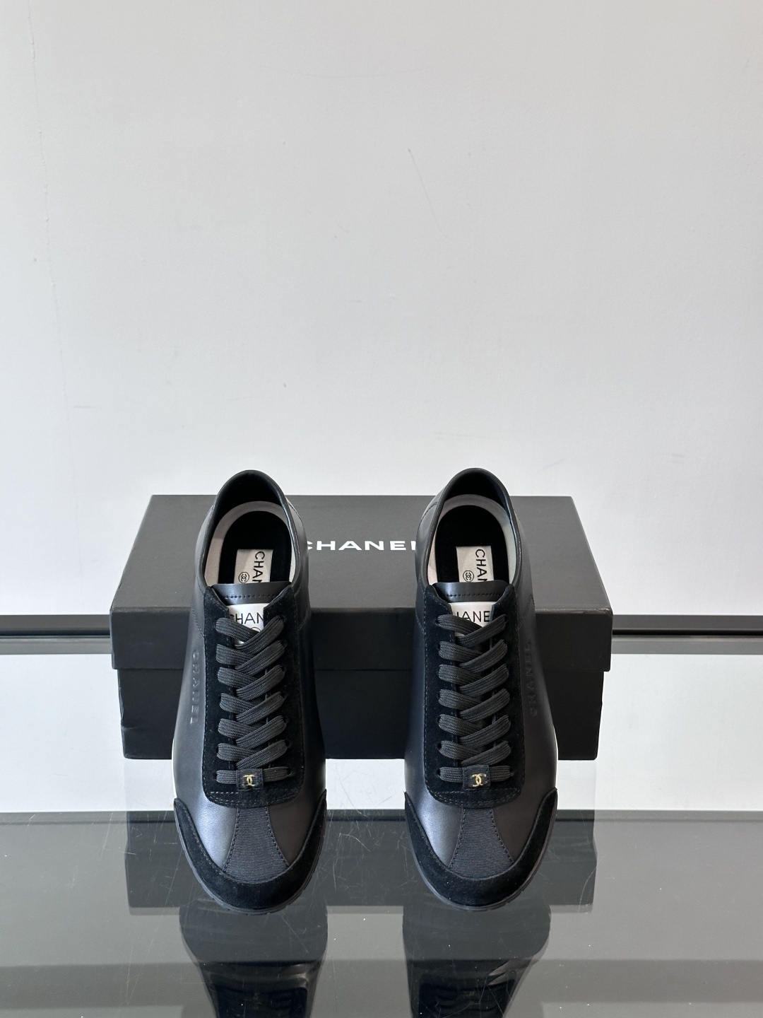 Chanel Luxury Black Leather and Suede Low-Top Sneakers