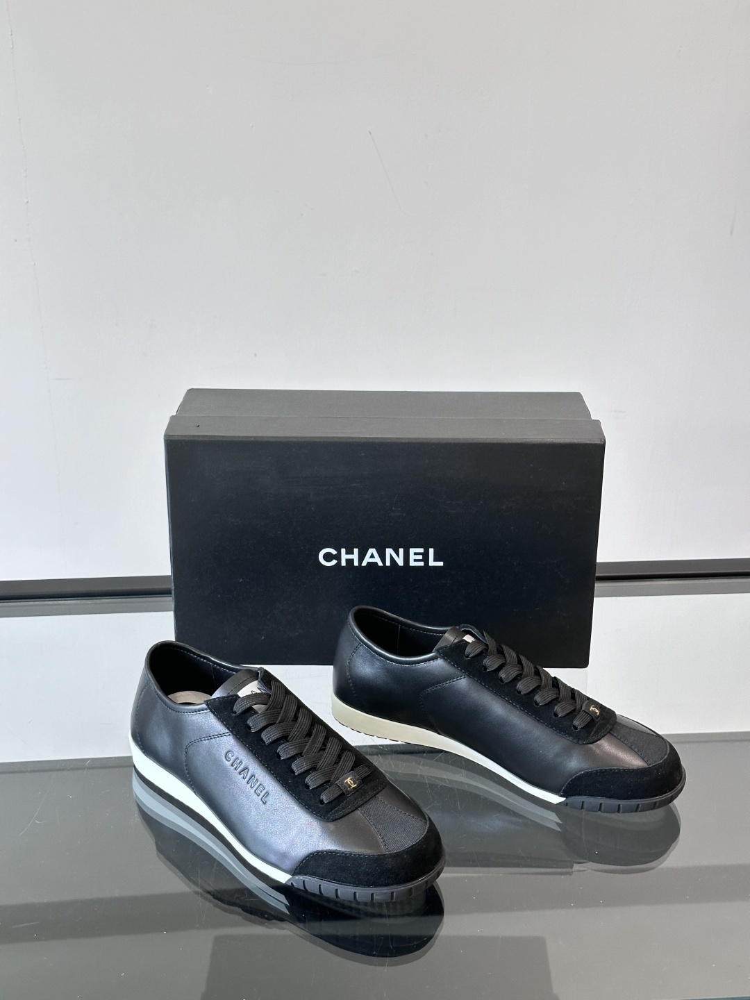 Chanel Luxury Black Leather and Suede Low-Top Sneakers