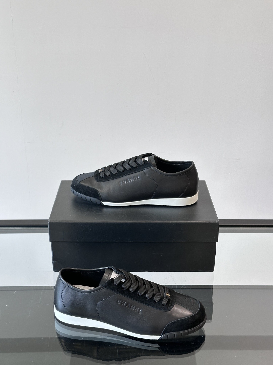 Chanel Luxury Black Leather and Suede Low-Top Sneakers