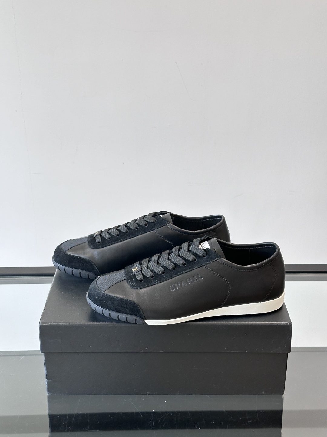 Chanel Luxury Black Leather and Suede Low-Top Sneakers