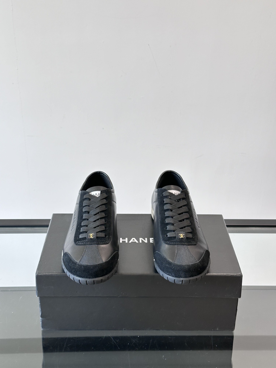 Chanel Luxury Black Leather and Suede Low-Top Sneakers