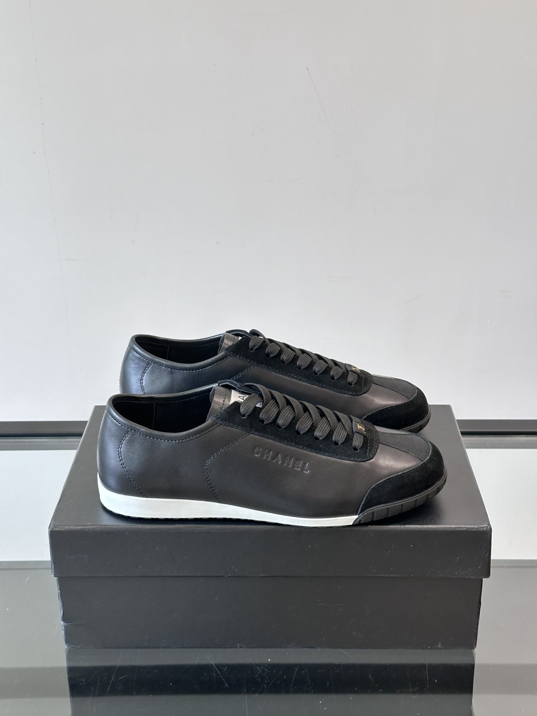 Chanel Luxury Black Leather and Suede Low-Top Sneakers