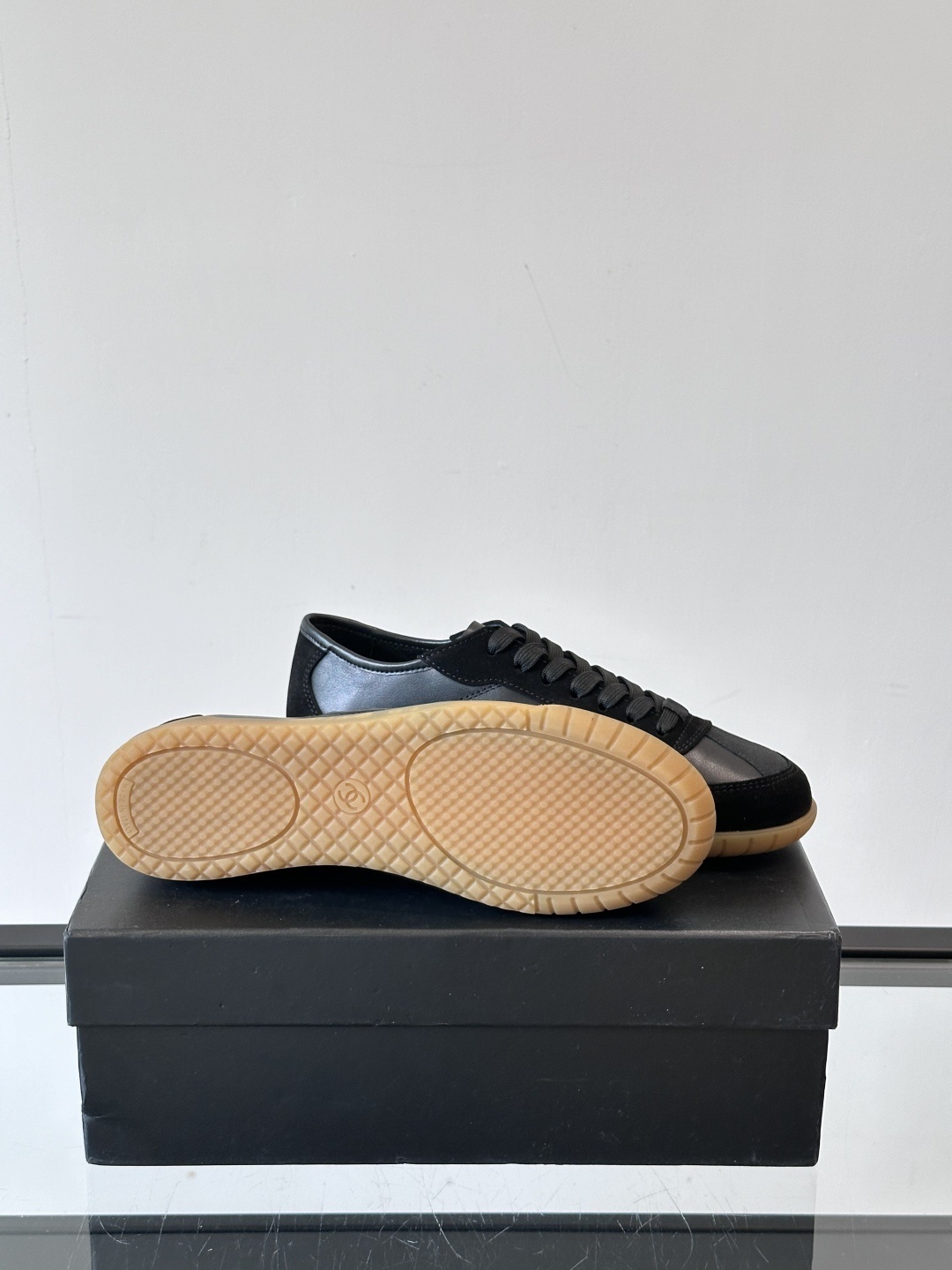 Chanel Luxury Black Leather and Suede Sneakers with Gum Sole