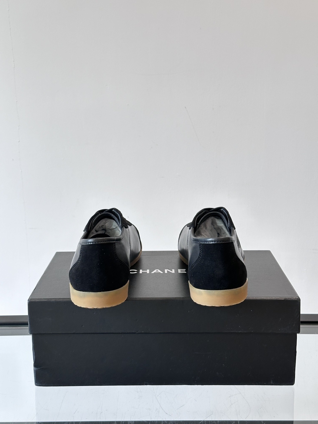 Chanel Luxury Black Leather and Suede Sneakers with Gum Sole