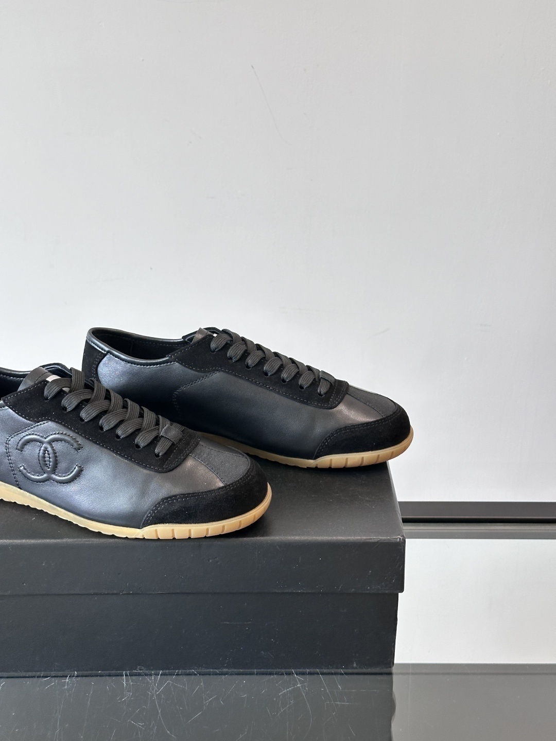 Chanel Luxury Black Leather and Suede Sneakers with Gum Sole