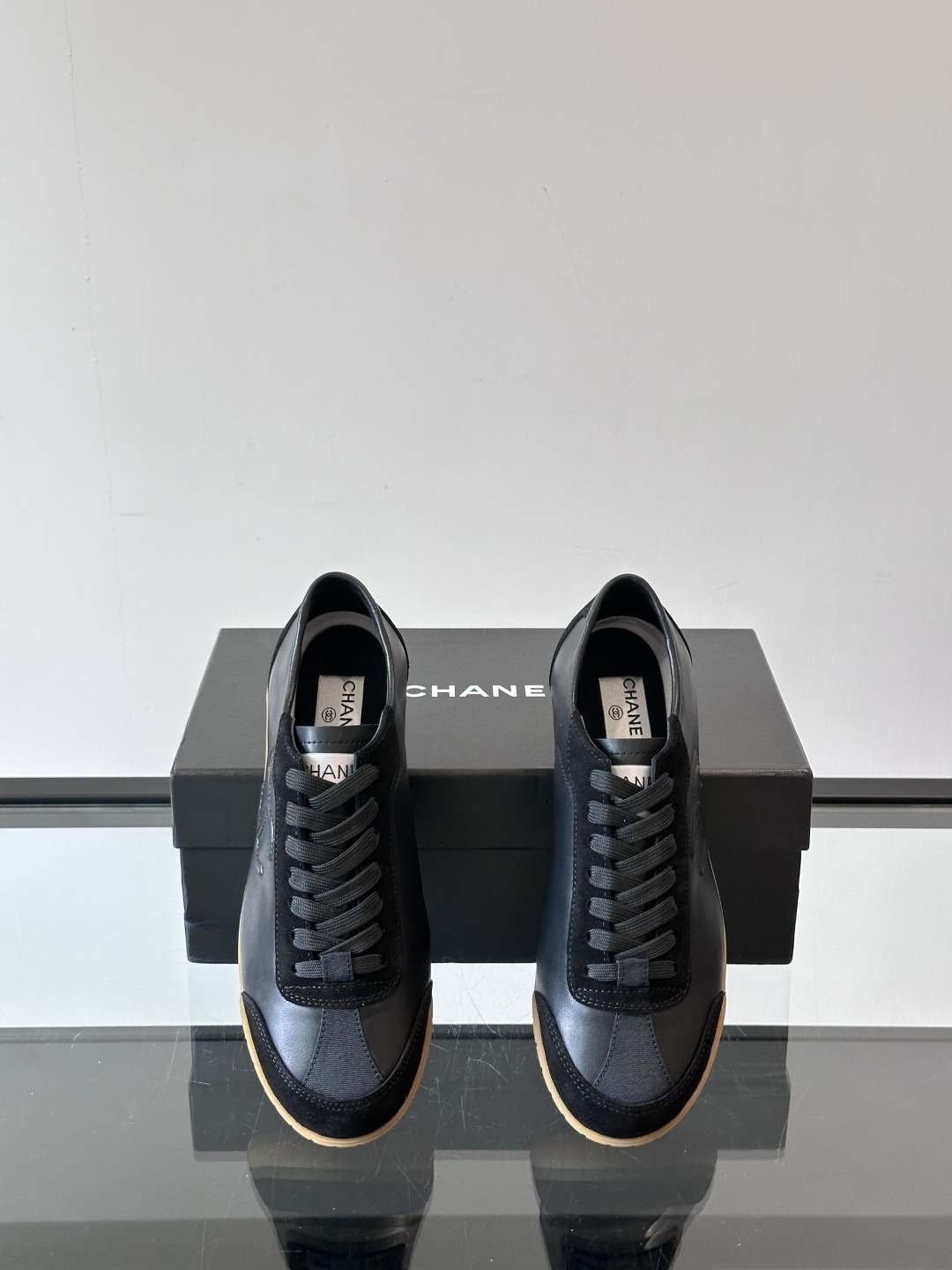 Chanel Luxury Black Leather and Suede Sneakers with Gum Sole