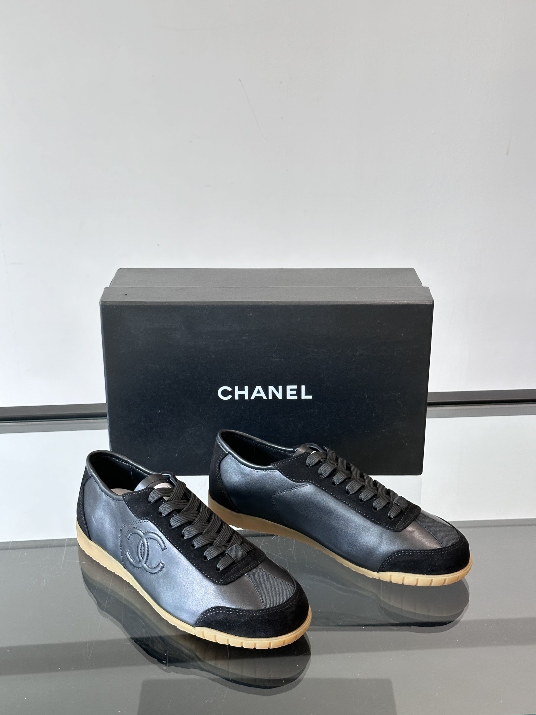Chanel Luxury Black Leather and Suede Sneakers with Gum Sole