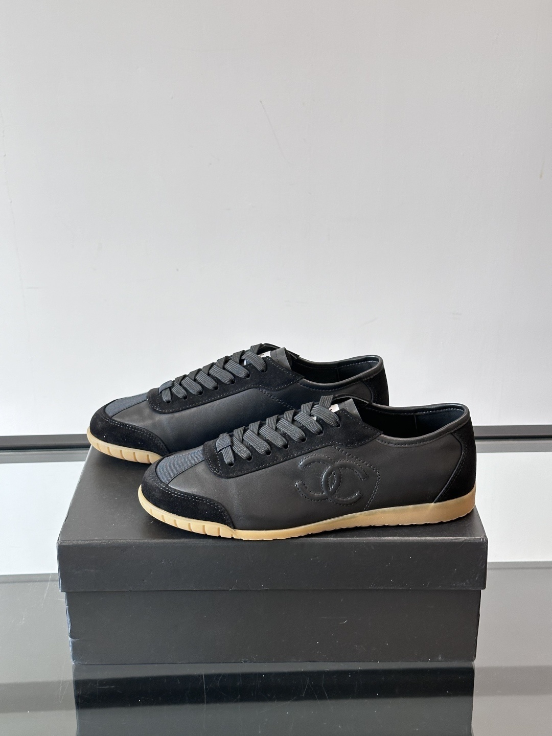 Chanel Luxury Black Leather and Suede Sneakers with Gum Sole
