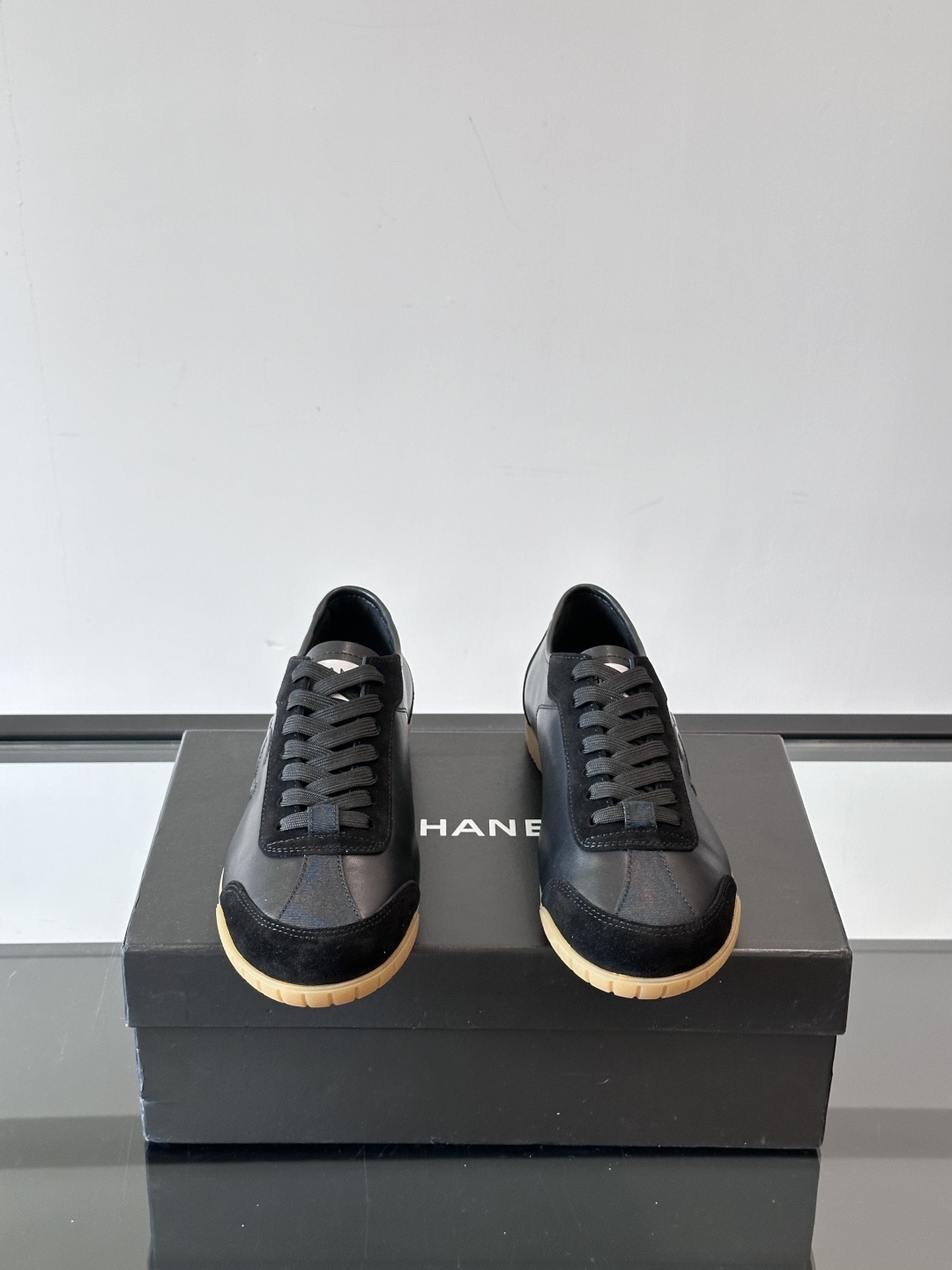 Chanel Luxury Black Leather and Suede Sneakers with Gum Sole