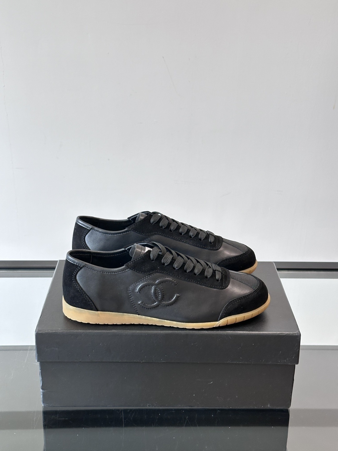 Chanel Luxury Black Leather and Suede Sneakers with Gum Sole