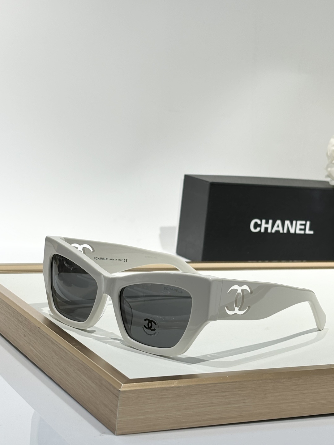 Chanel Luxury Square Sunglasses with Iconic White Cut-out Logo
